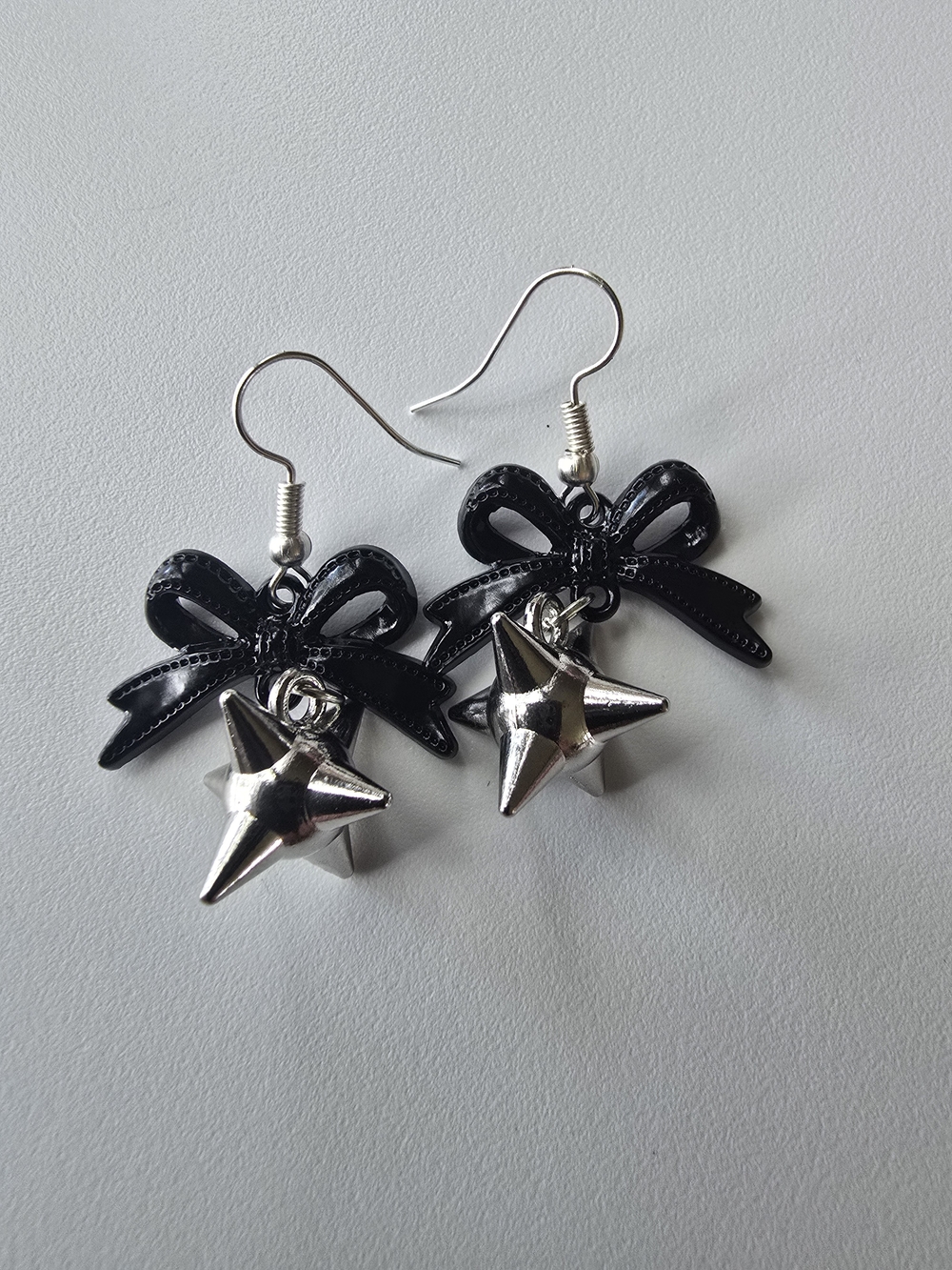 Black Bow Earrings with Silver Star Charms